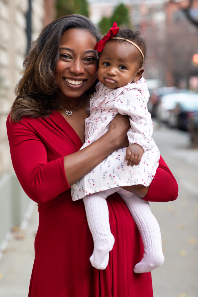 Authentic holiday photos NYC documenting new family's first Christmas in manhattan neighborhood