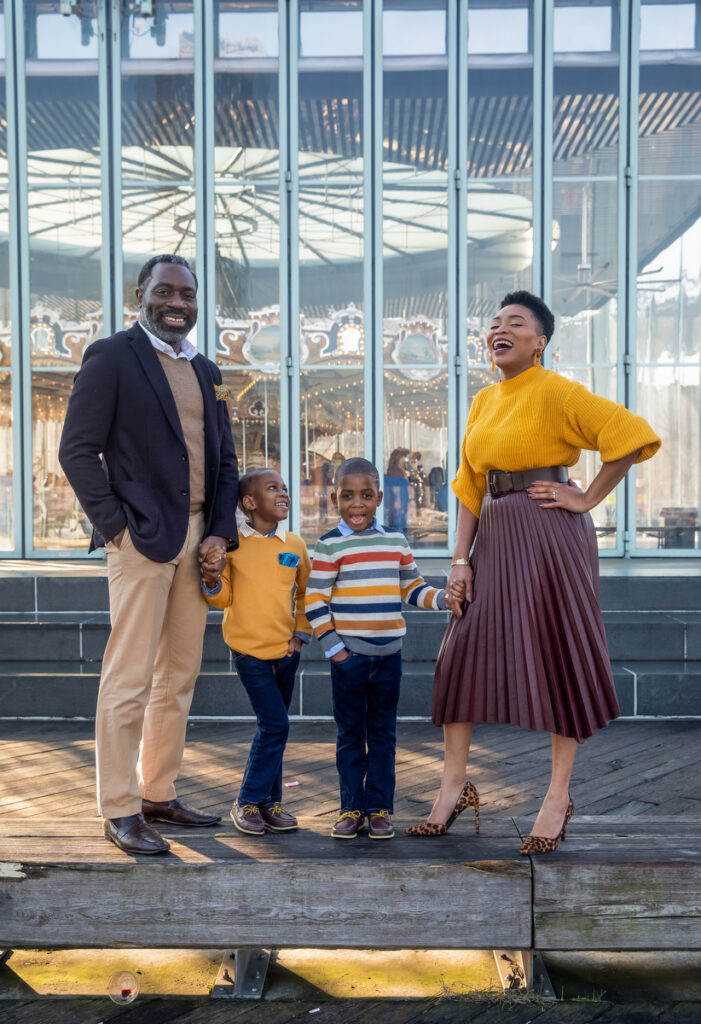 Authentic holiday photos NYC: Family of four for Christmas session in DUMBO, Brooklyn.