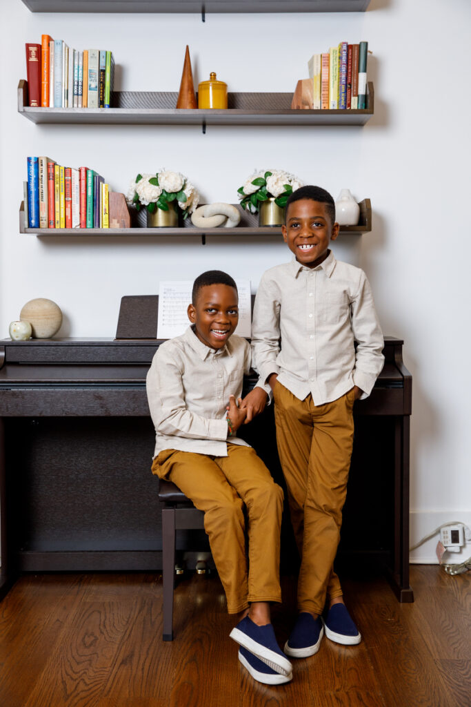 Candid family moments for authentic holiday photos NYC: story time in cozy Brooklyn living room